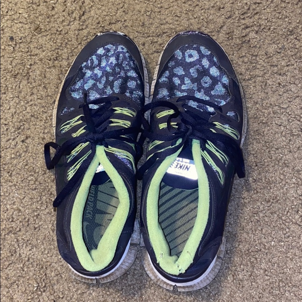 Neon green and purple Nike shoes size 10